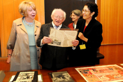 Irish President Michael Higgins examines Western Americana materials at the Bancroft Library. (Photo by Peg Skorpinski.)