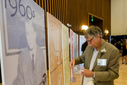 Les Hausrath, a 1969 UC Berkeley graduate and one of the founders of the Public Service Center, marks his story on a public service timeline at the center's 50th anniversary party on Sunday. (Photo courtesy of Kelley L Cox - KLC)