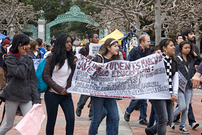 students walking with banner