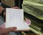 Project archivist David Uhlich examines one of the handful of diaries in the Brown archive. Photo by UC Berkeley Public Affairs.