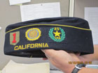 An American Legion cap belonging to the former governor is part of the archive. Photo by UC Berkeley Public Affairs.