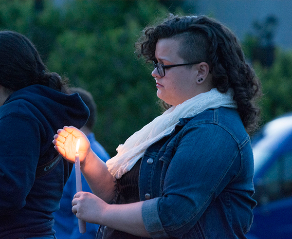 woman lighting candle