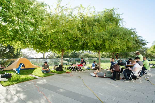 students outside with tent