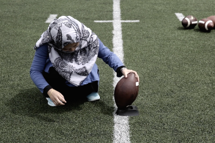 Student with football