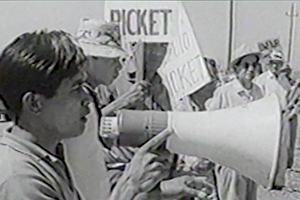 Filipino farmworker with bullhorn