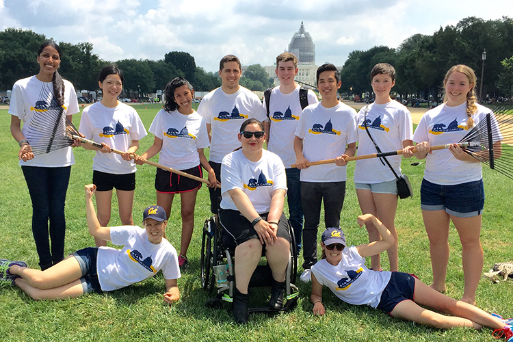 interns with tools on the National Mall