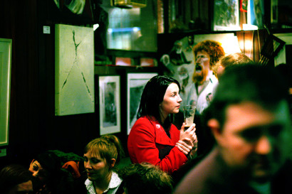 woman drinking at a bar