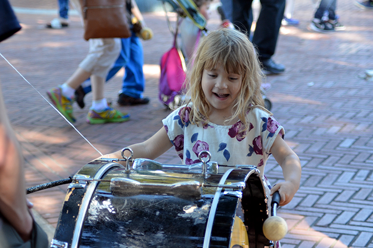 girl playing a drum