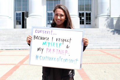 student holding sign