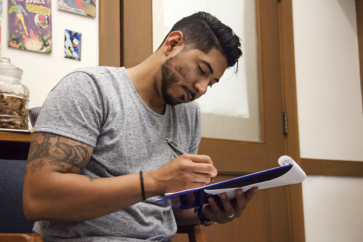 Chosen to speak at the School of Social Welfare's May 14 graduation ceremony, Vargas works on his message to fellow grads. (UC Berkeley photo by Brittany Murphy)