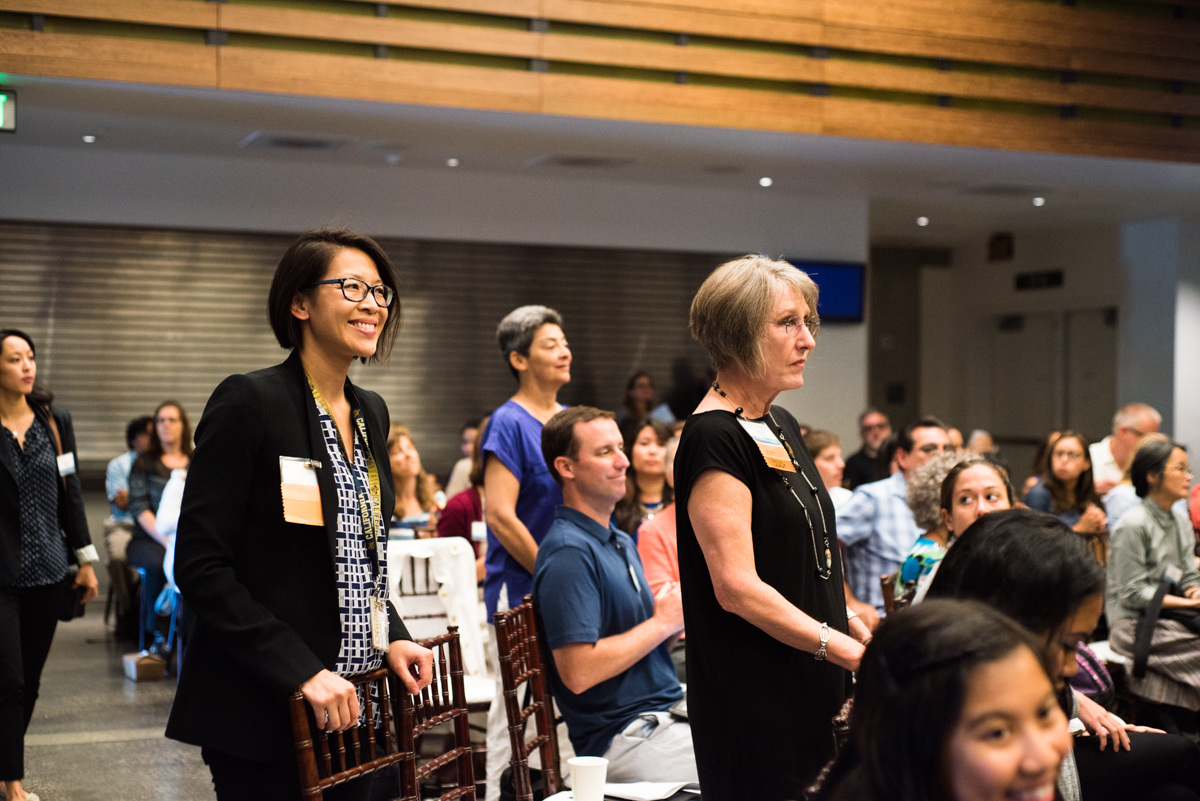 Staffers gather during the conference