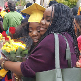 Keyanna hugging student