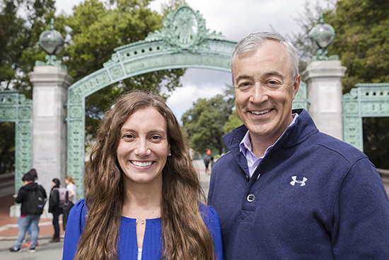 Portrait of Solly Fulp and Amy Gardner standing in front of Sather Gate at UC Berkeley.