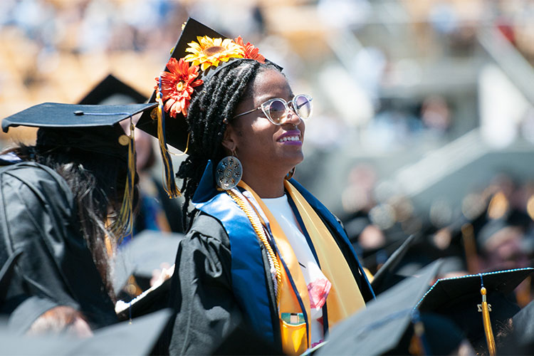 grad with flowers on cap