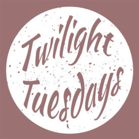 An image of the logo for "Twilight Tuesdays" featuring the title in a white circle representing a moon surrounded by a biege pink background. 