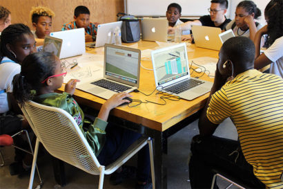 students at their laptops