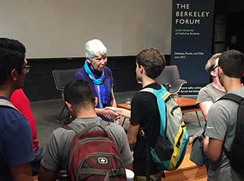 Chancellor Christ speaks with students following the event