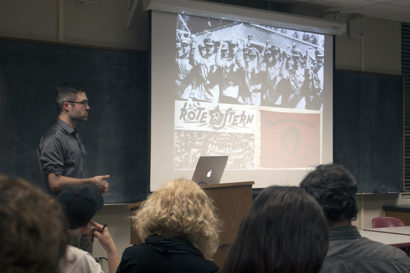 Mark Bray, an adjunct professor of history at Dartmouth College and author of Antifa: The Anti-Fascist Handbook, speaks at UC Berkeley on Monday, Nov. 13. (UC Berkeley photo by Thomas Texeira)