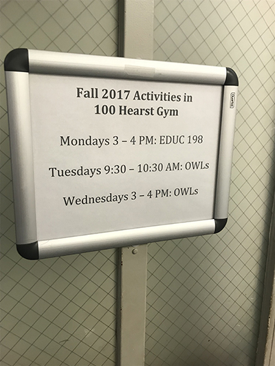 Sign showing Fall 2017 activities in 100 Hearst Gym, including OWLs meetings.