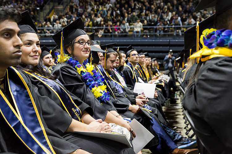 UC Berkeley graduates listen as Chancellor Carol Christ speaks during the commencement ceremonies. 