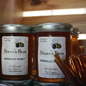 Stacked jars of Steve's Bees Berkeley Honey