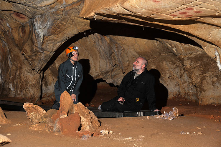 Conkey and collegue in Chauvet Cave.