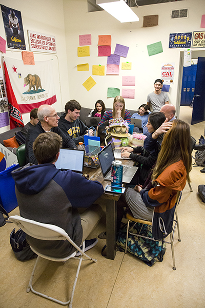 Cal Band executive committee members, including five students and director Bob Calonico, gathered for a meeting.