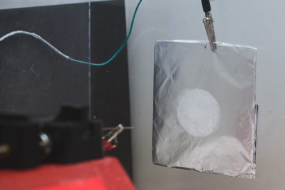 The white fiber mat containing an enzyme, seen here in white, contains a stable enzyme that can break down a toxic chemical. Credit: Christopher DelRe and Charley Huang.