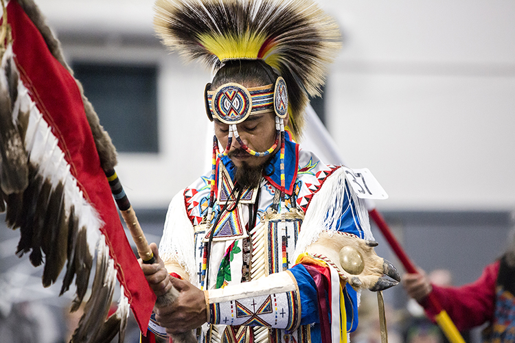 Dancer holding a staff