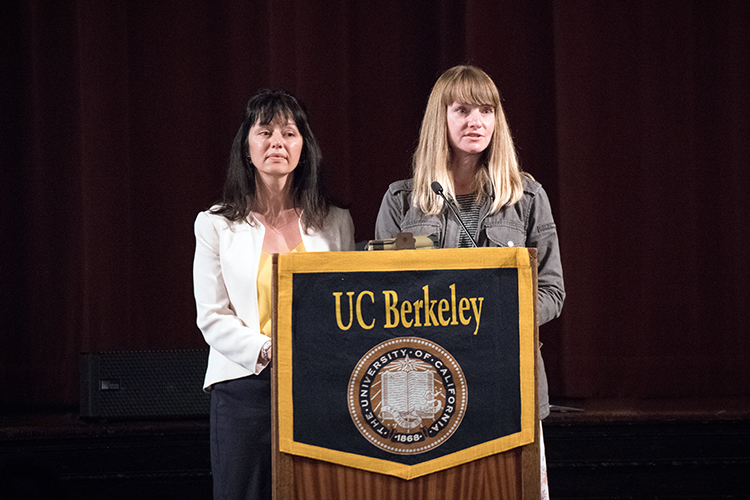 Berkeley staff members Amelia Miazad and Kara Ganter accept their award for starting an online community after the 2016 election.