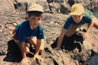 Photo: Noah and his older brother looking at tadpoles on the north shore of lake superior