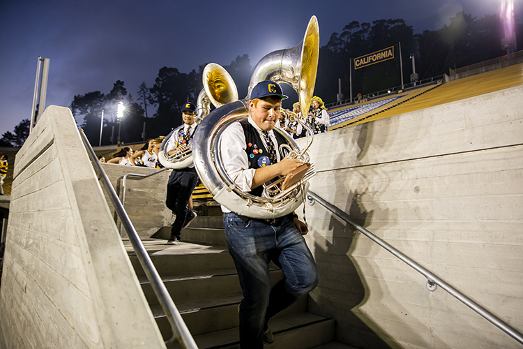 cal band tuba player walks onto the field