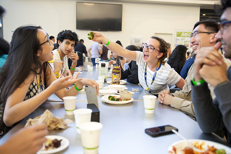 new students eat lunch together