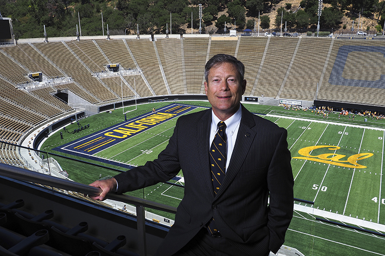 Athletic Director Jim Knowlton stands in front of Memorial Stadium.