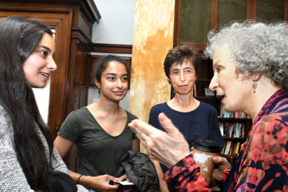 Margaret Atwood talks with students at a reception