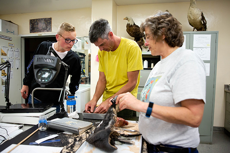 Carla works with students in the lab