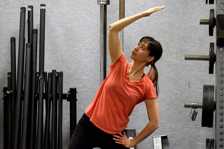 A woman stretches 