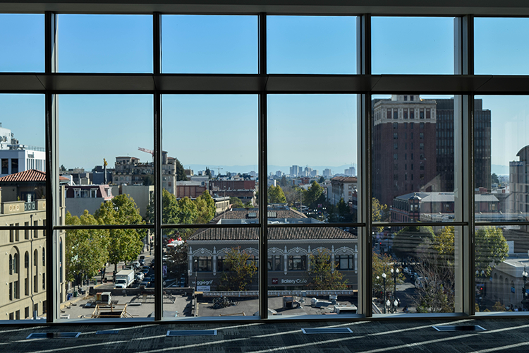 The view of Oakland's skyline from inside the new building.