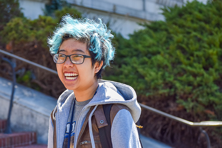 a student with blue hair