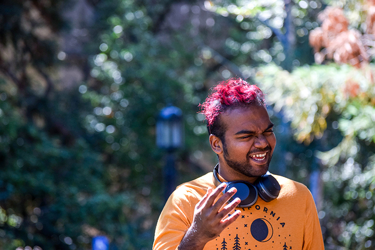 a student with pink hair