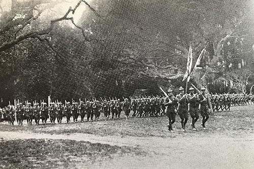 The U.S. School of Military Aeronautics was founded on campus in 1917, and the "ground school" was considered one of the two best schools of its kind in the country. Many alums entered the aviation service and, several became instructors and officers. In this photo is the Fleet Flying Cadets' color guard.