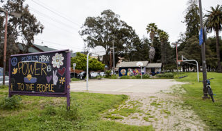 photo of people's park with a sign that reads "power to the people"