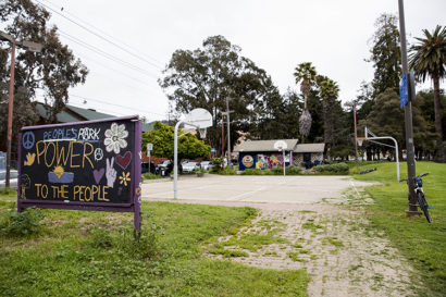 photo of people's park with a sign that reads "power to the people"