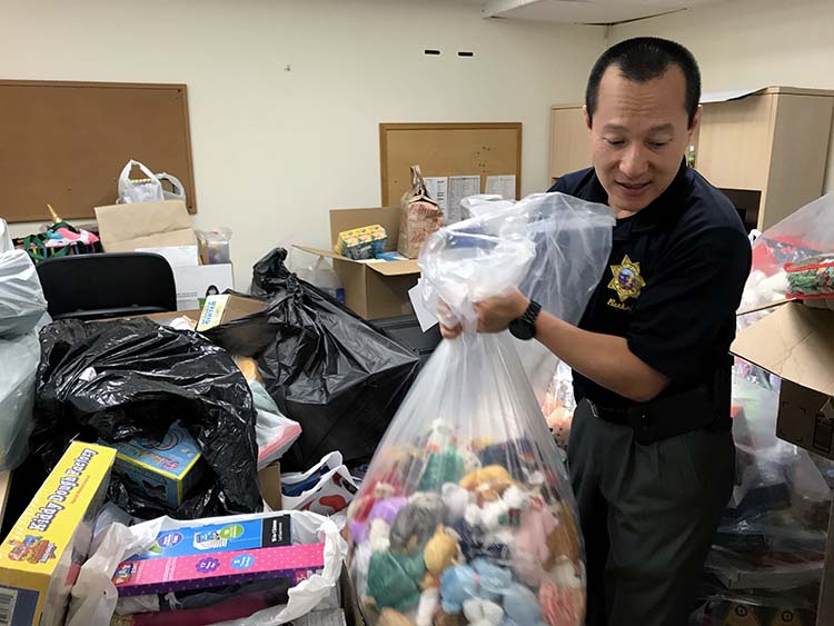 a man hauls a bag of toys