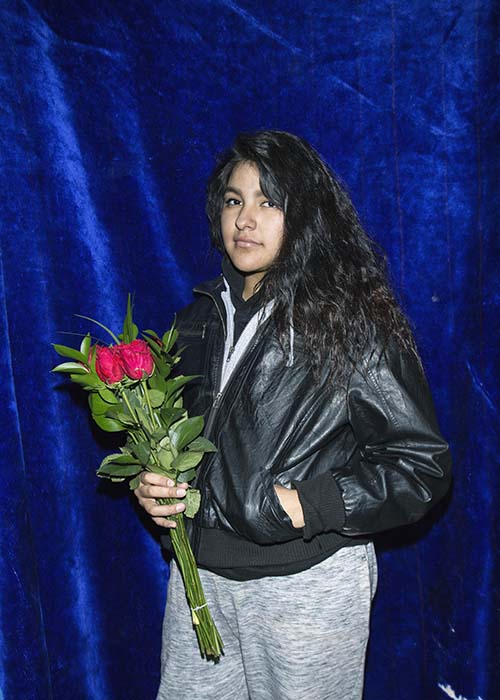 A woman holding roses