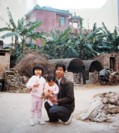 Henry and his sister as young kids in China