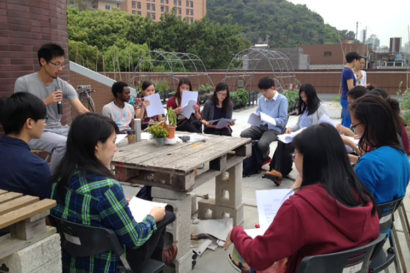 Henry leads a poetry workshop in Hong Kong