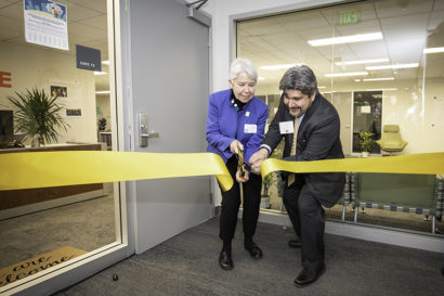 Chancellor Christ and Vice Chancellor Oscar Dubon cut the ribbon for the new Basic Needs Center