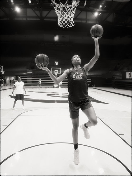 Anigwe about to shoot a basket