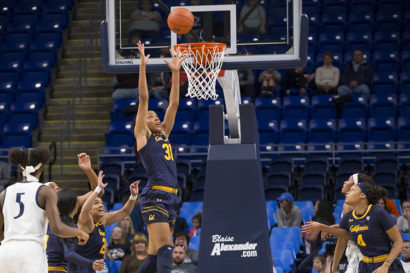 Anigwe shooting a basket